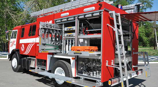 A firetruck with utility doors open