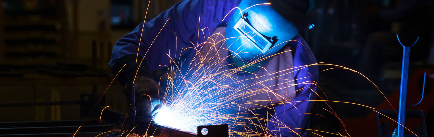 A welder with sparks